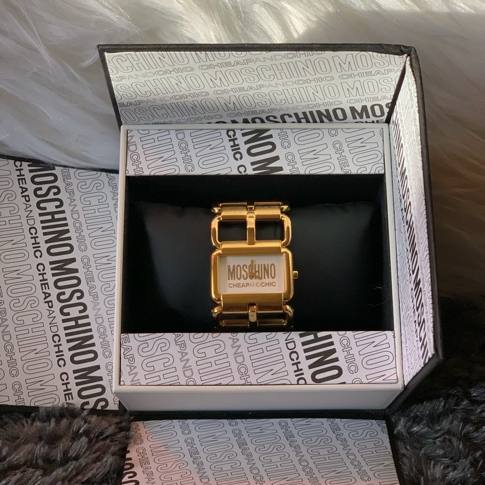 Like new, never worn Moschino gold watch